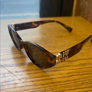 Miu Miu Brown Sunglasses with Gold Accents